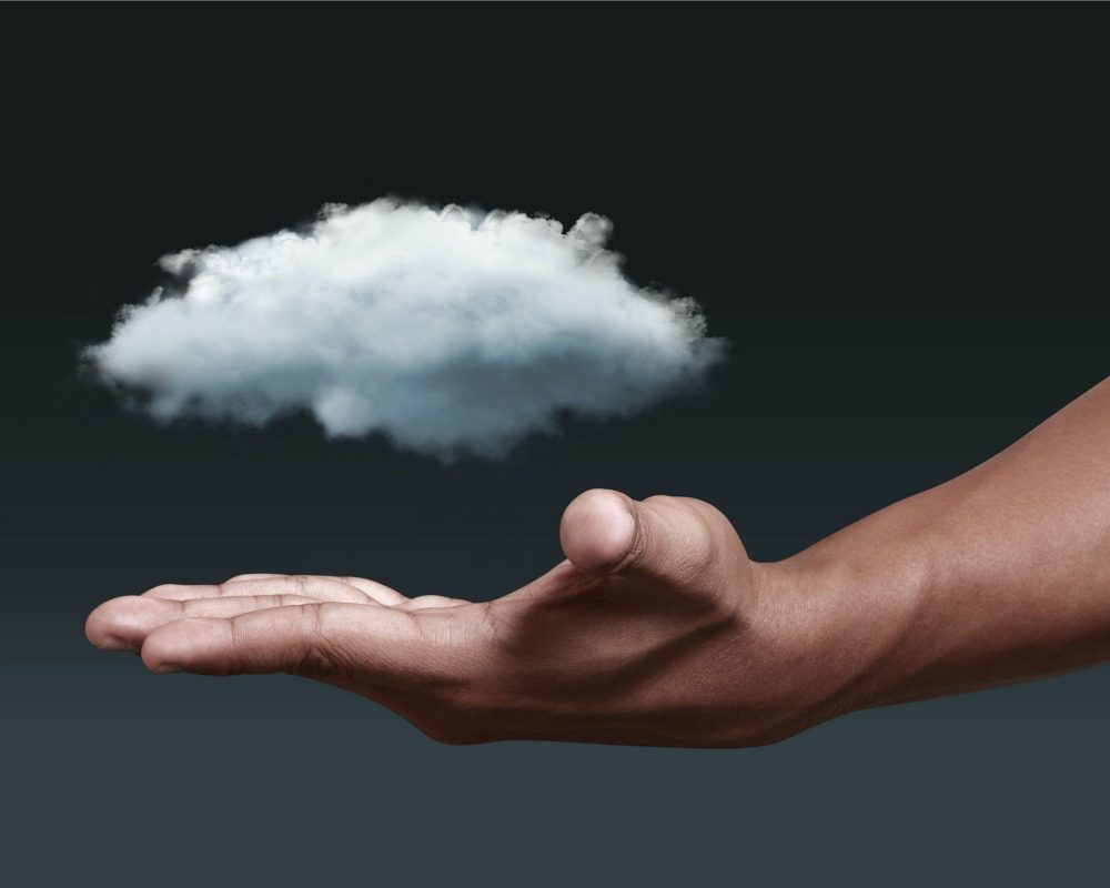 Cloud computing icon with hand