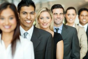 group of business executives standing in a row