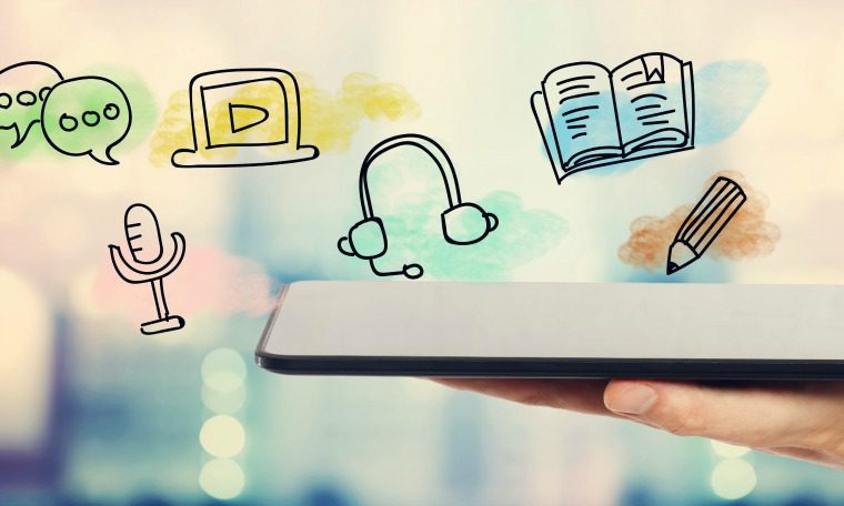 E-learning concept with man holding a tablet computer