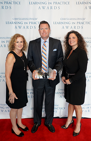 Julie Milanowski, Daniel Rundhaug and Angie Wittkowski of Davenport University.