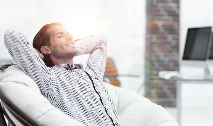businessman relaxing in a comfortable chair in the office